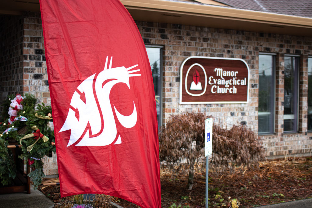 WSU flag in front of a church