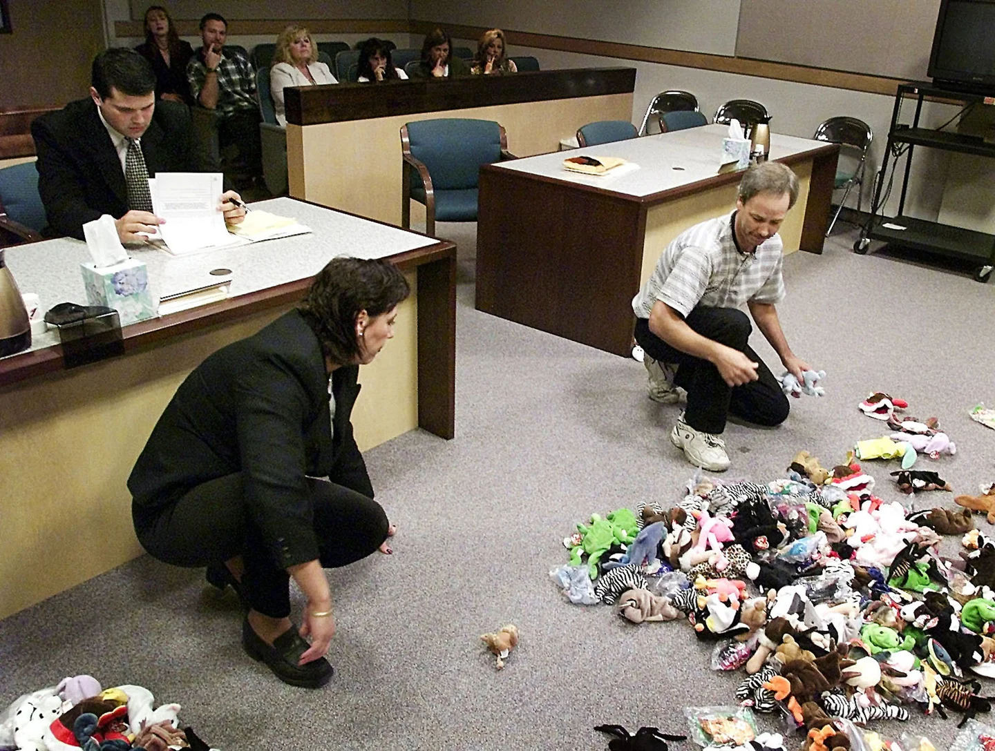 Francis and Harold Mountain separating beanie babies at their divorce hearing. (Photo courtesy of Reuters)